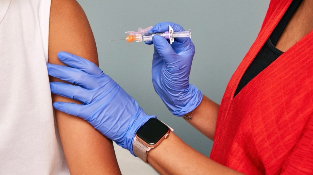 Close-up image of vaccination in shoulder - Photo by flickr user self_magazine
