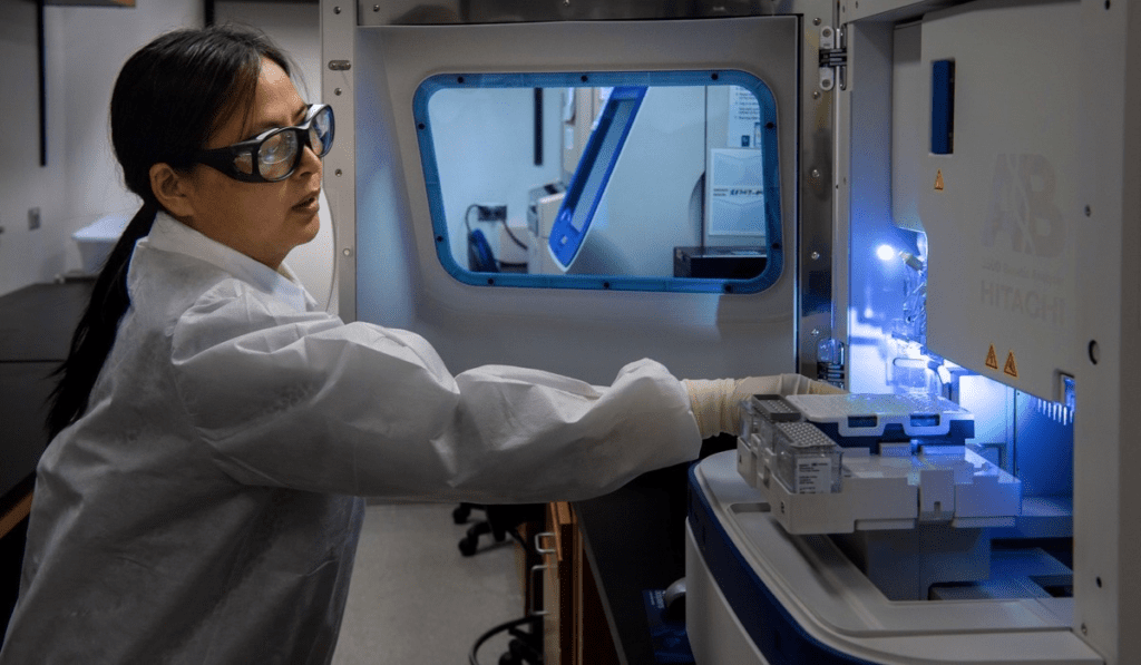 Female scientist testing laboratory sample